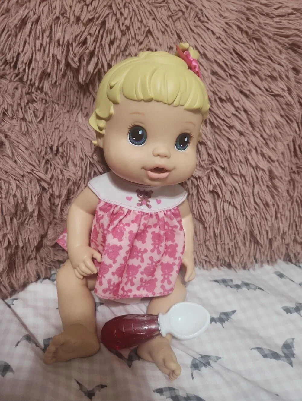 Hasbro Baby Alive Make Me Better baby doll with blonde hair